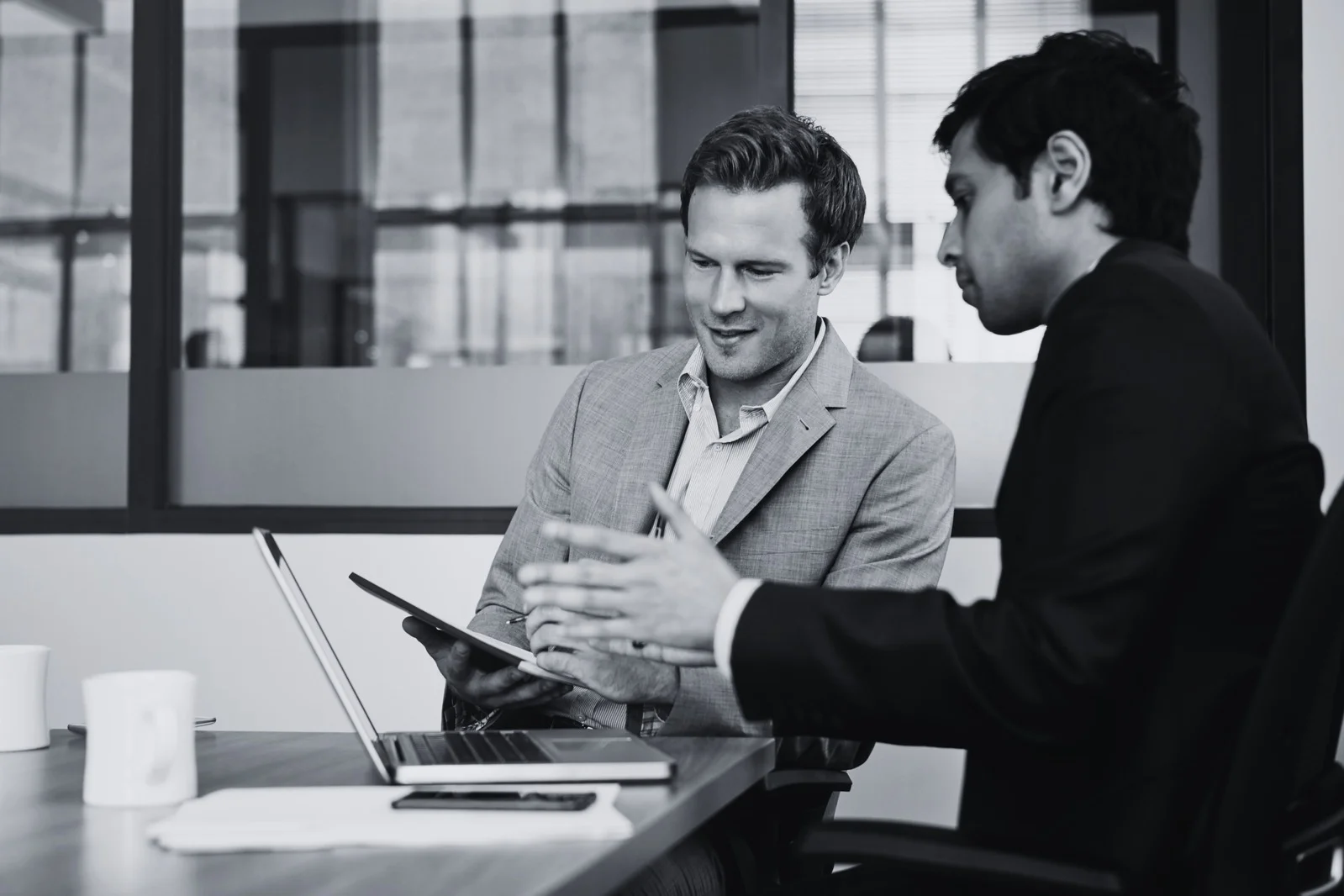 Men reviewing documents